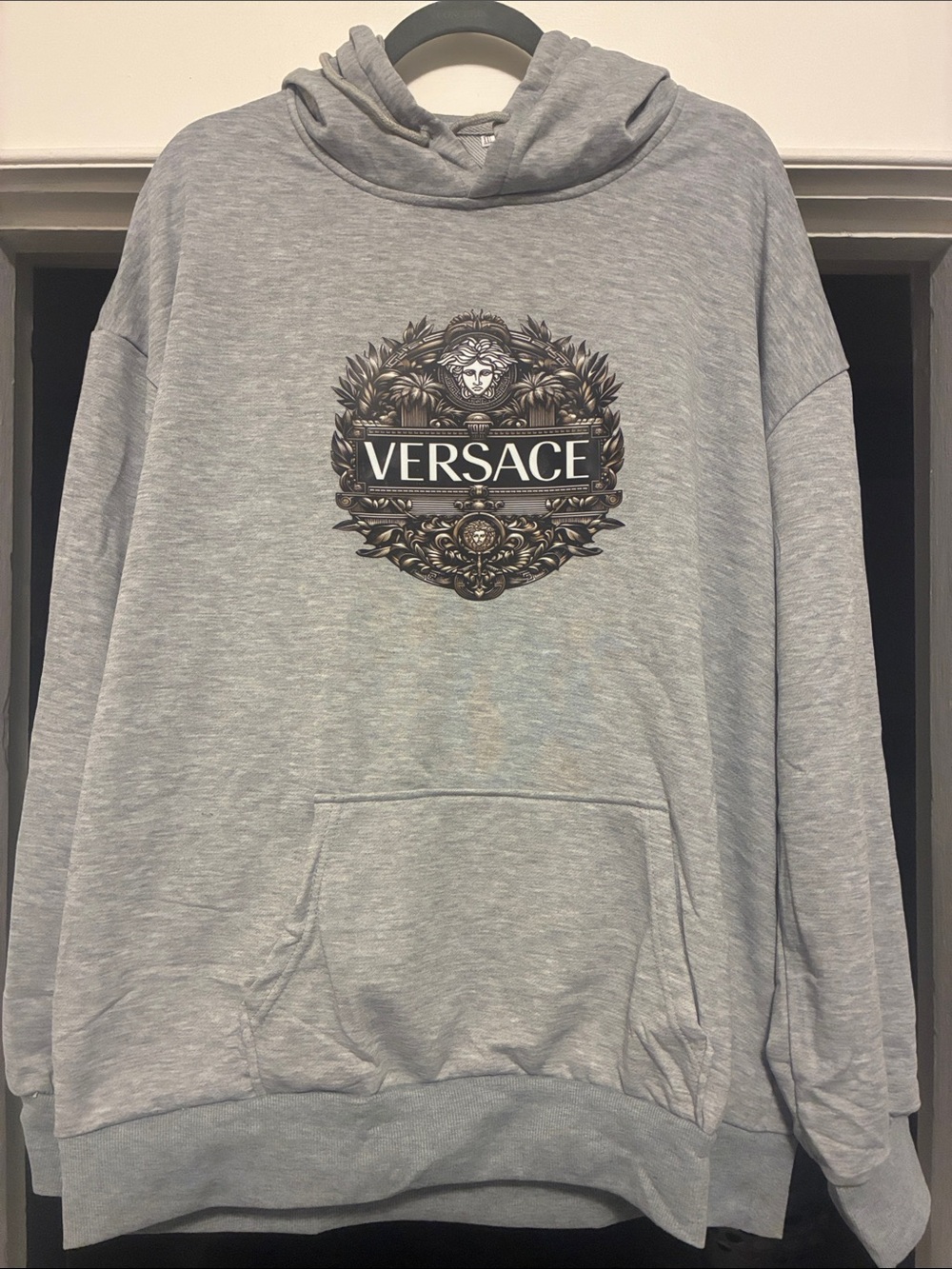 Versace style Light Gray Hooded Sweatshirt with Decorative Crest